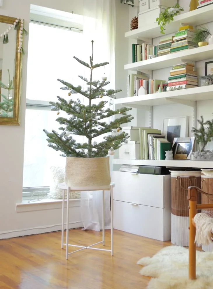 11 Ways to Make a Small Space for a Christmas Tree So Festive | Apartment Therapy