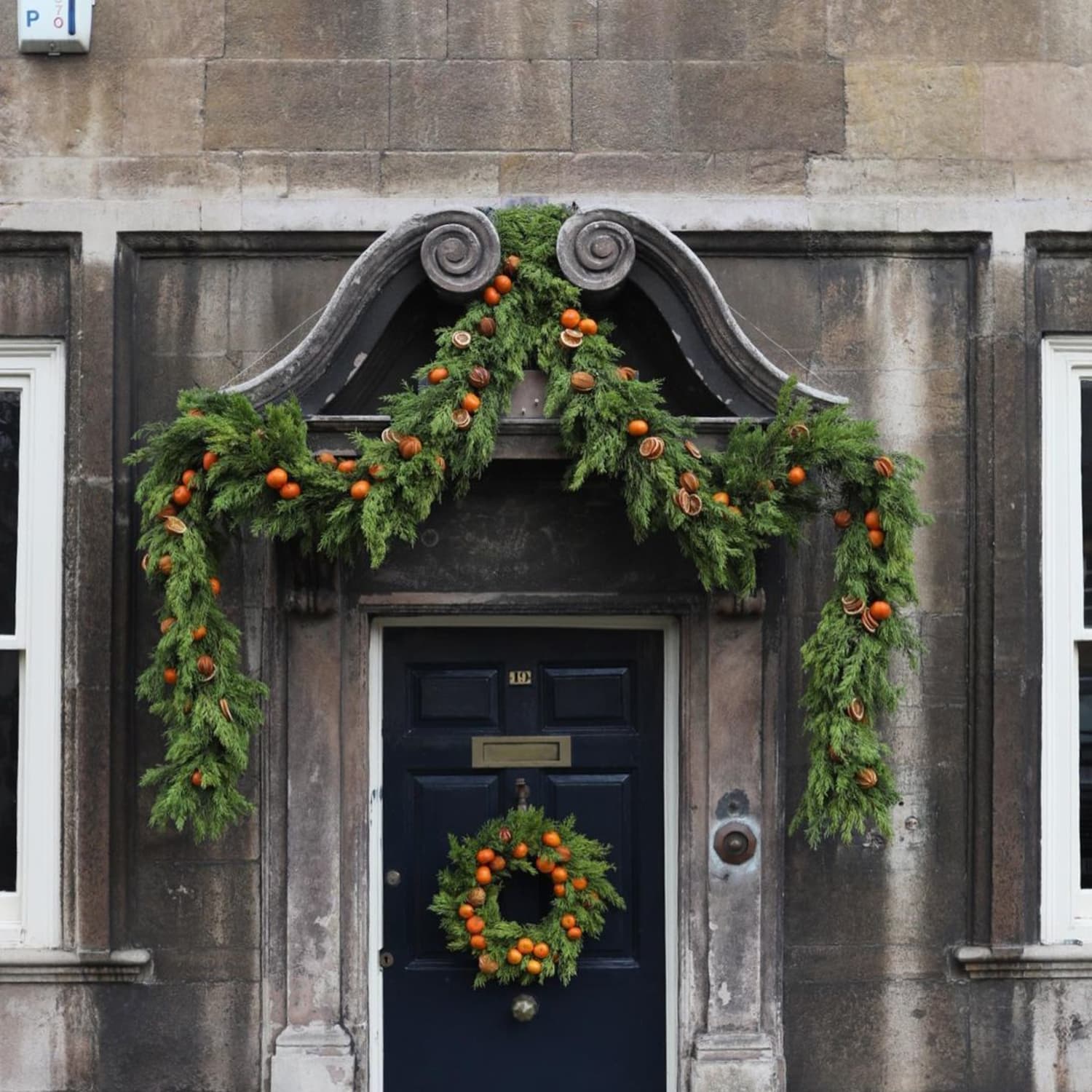 15 Christmas Door Decoration Ideas (With Inspiring Photos) | Apartment  Therapy