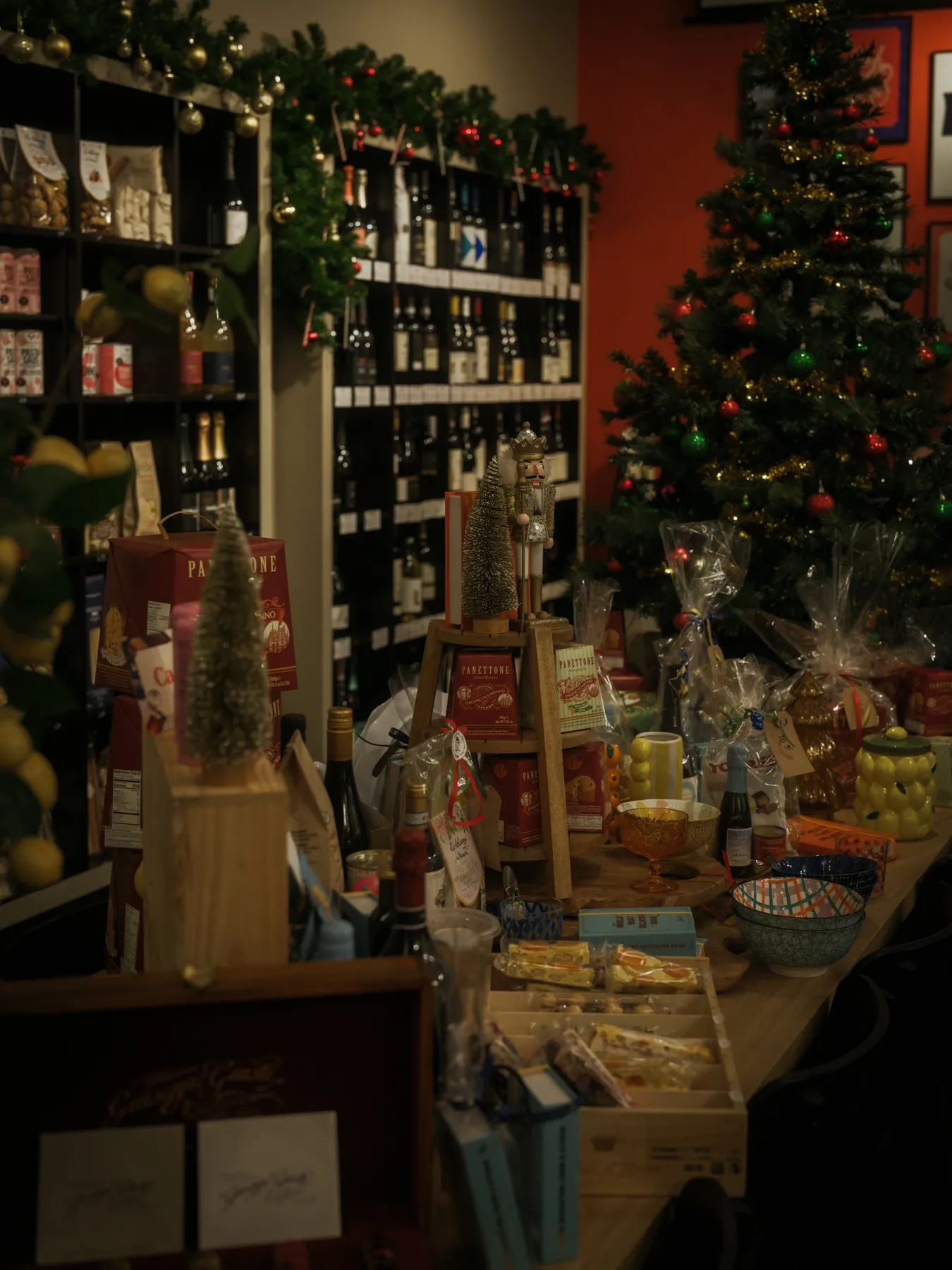 A christmas tree and festive gifts displayed in a shop - Free Photo on  Unsplash