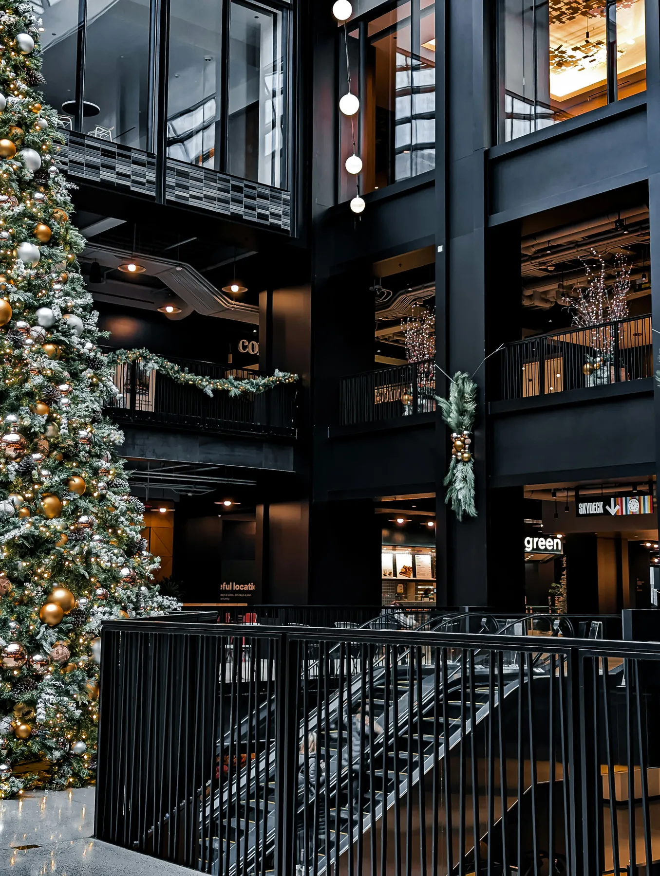 a christmas tree is in the middle of a building