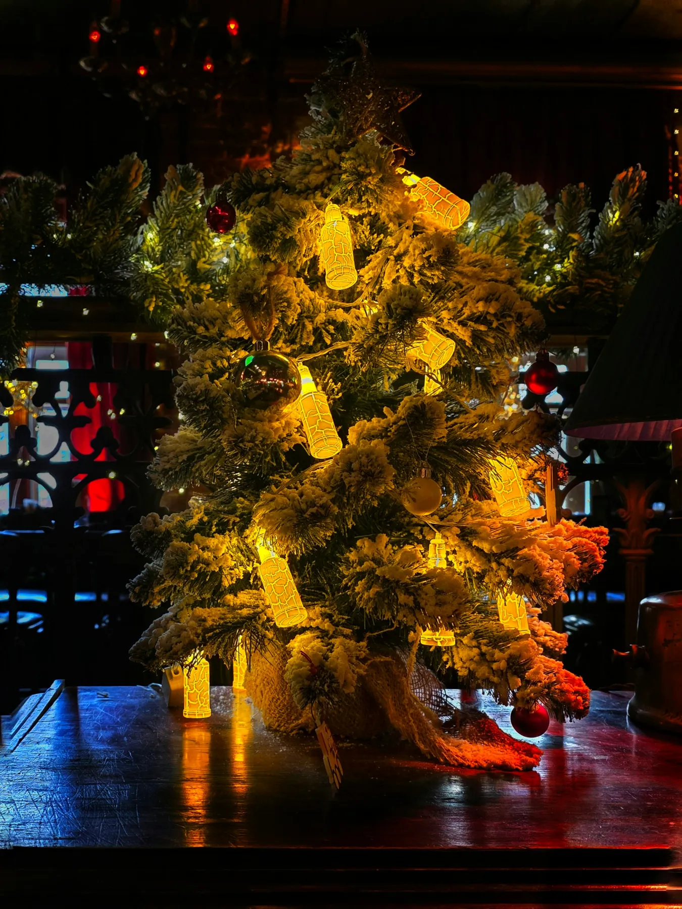A decorated christmas tree with glowing lights