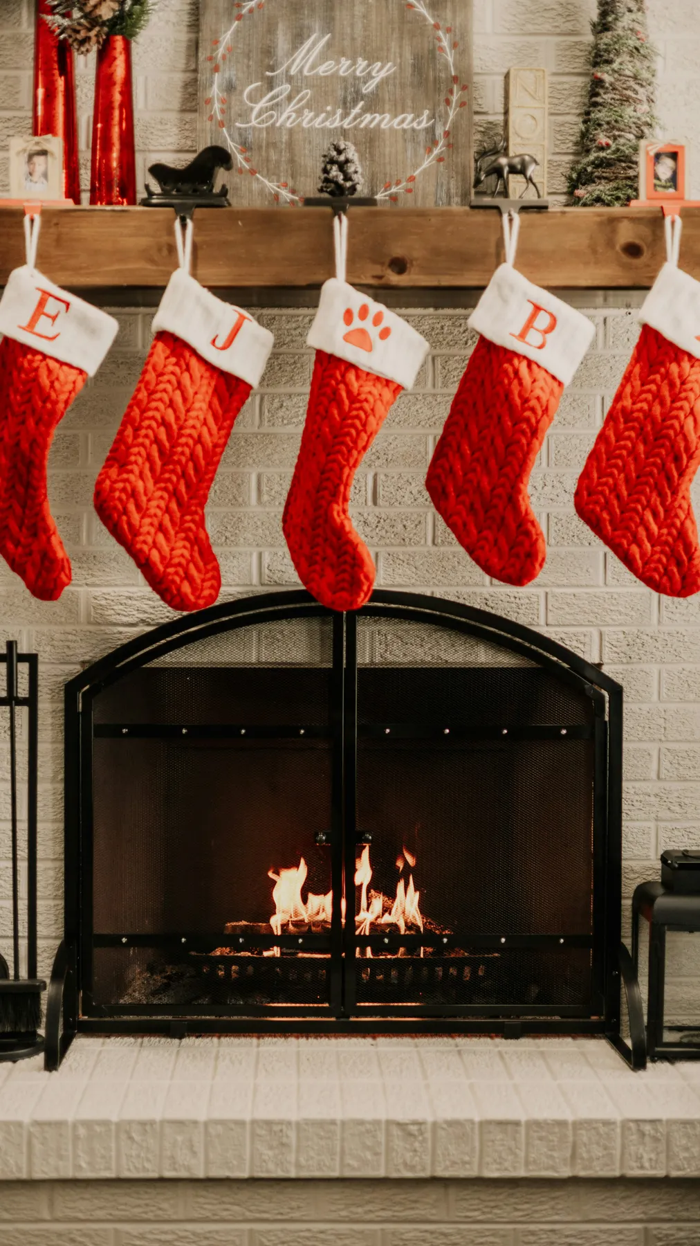 A fireplace with stockings hanging over it - Free Photo on Unsplash