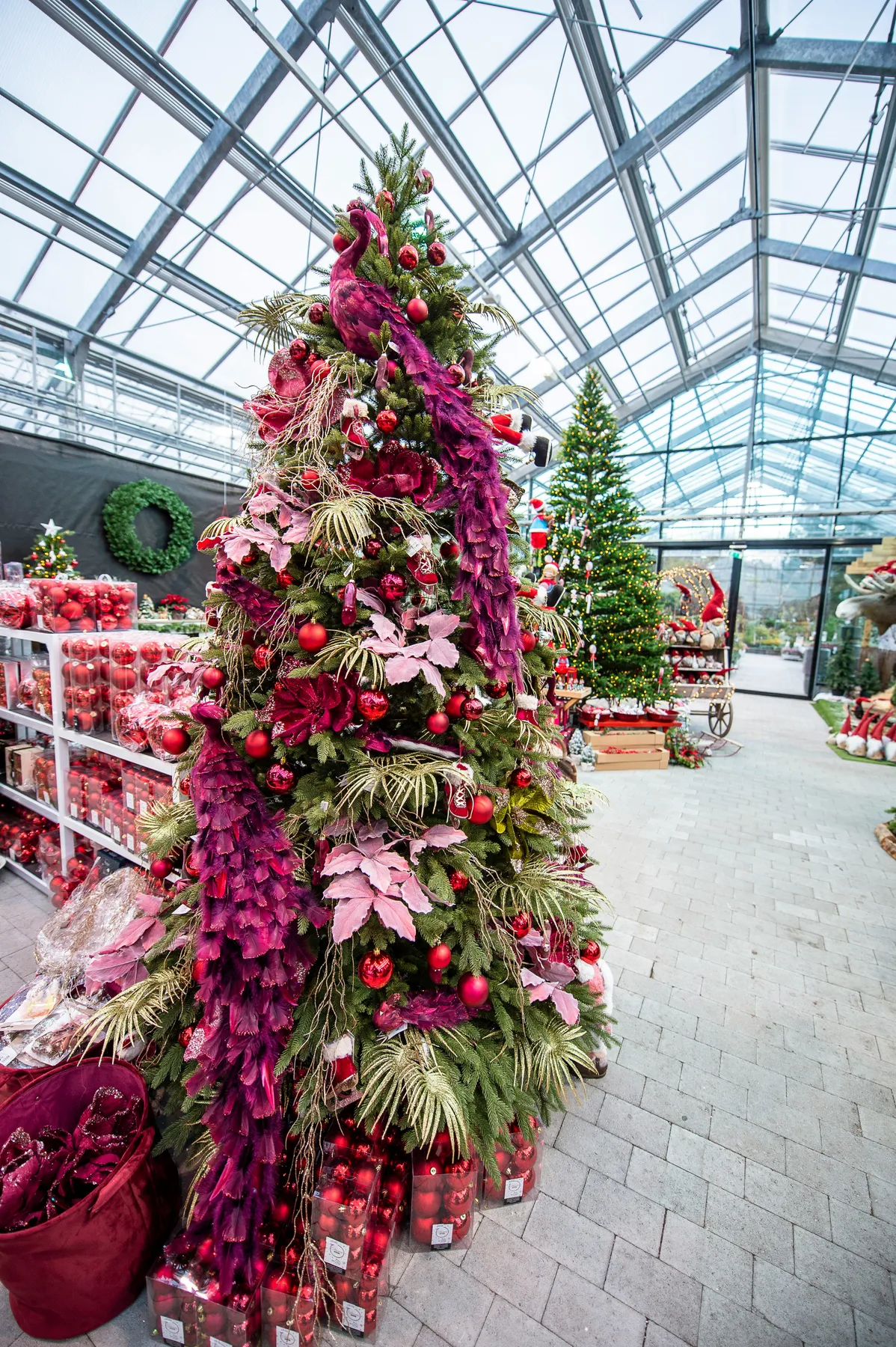 a large christmas tree in a building