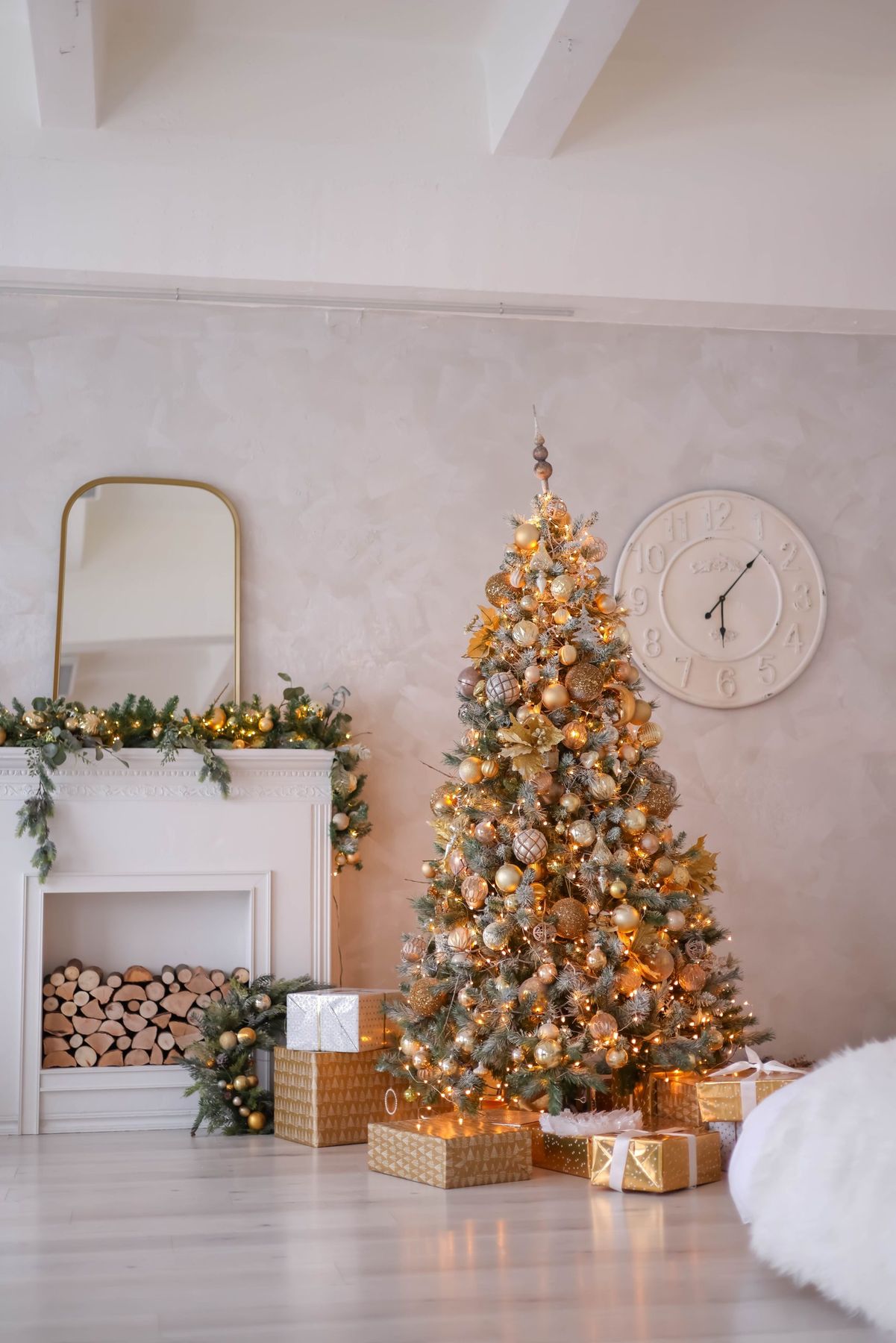 Beautifully decorated Christmas tree with elegant ornaments in a cozy living room setting.