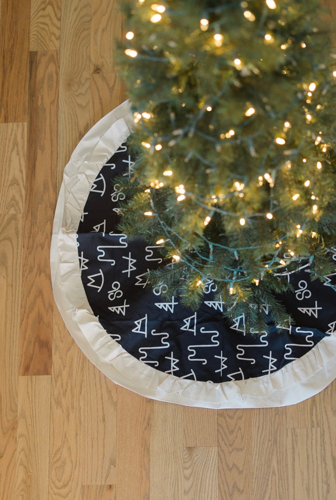 Black Brand Christmas Tree Skirt - Front Porch Wholesale