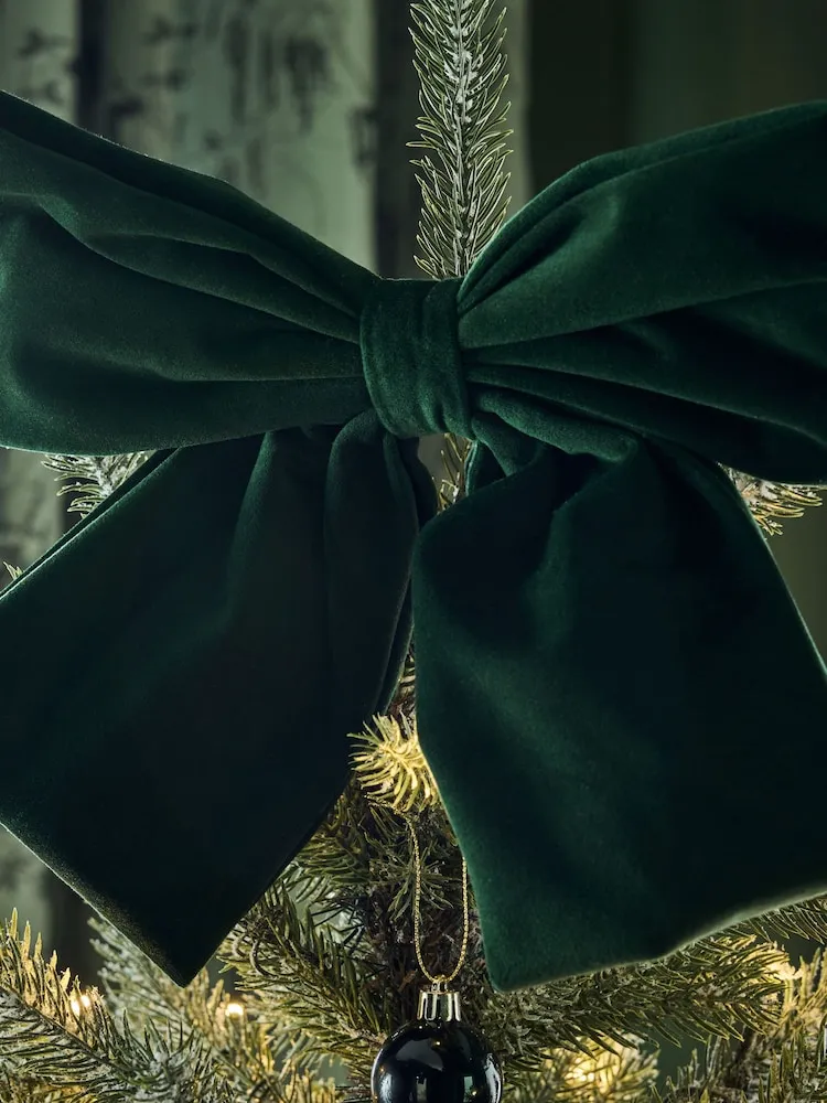 Buy Green Velvet Christmas Bow Tree Topper from Next Ireland