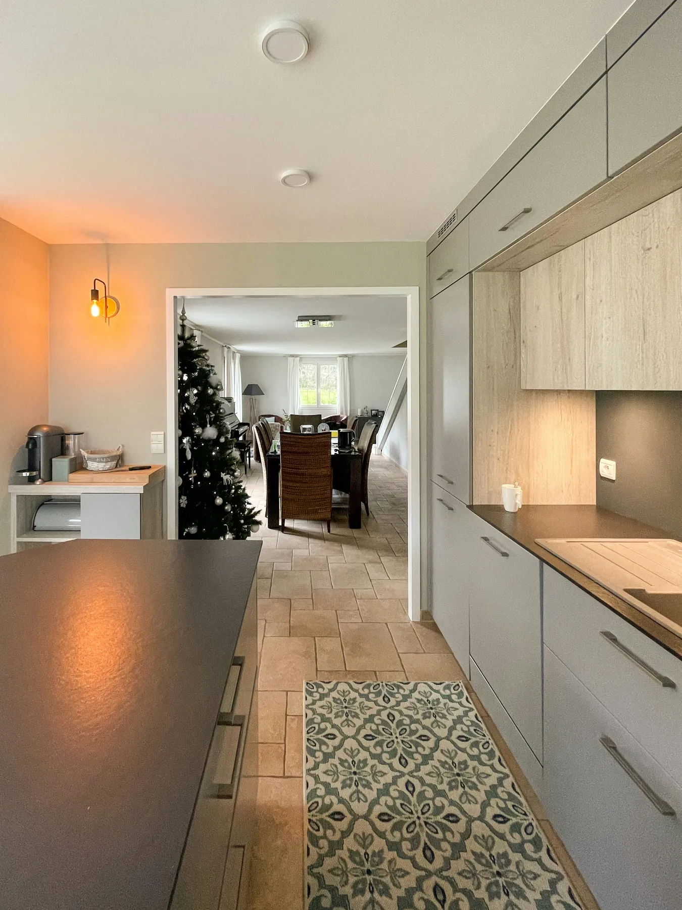 Christmas tree in modern kitchen in France. 
Film location available for rent via beazy.co