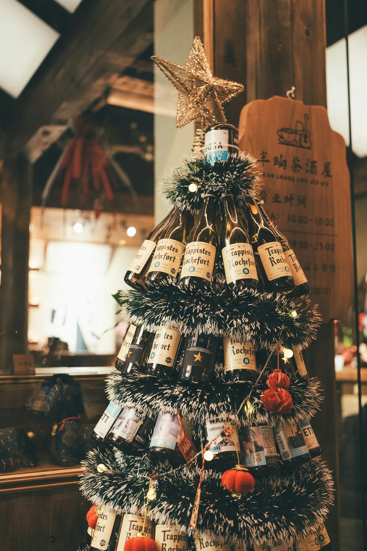 Christmas tree made of wine bottles with lights
