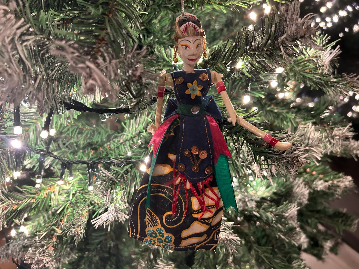 Decorate the tree with Christmas ornaments from around the world