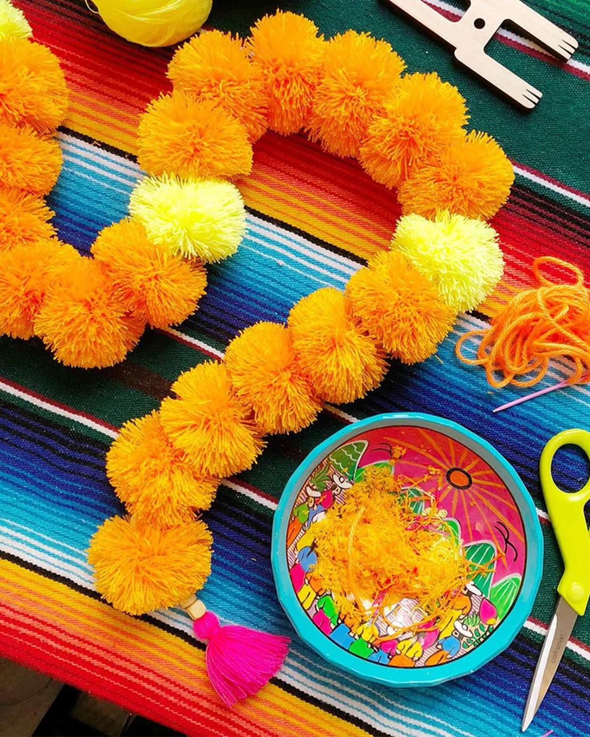 DIY Cempasúchil Pom Pom Garland - the neon tea party