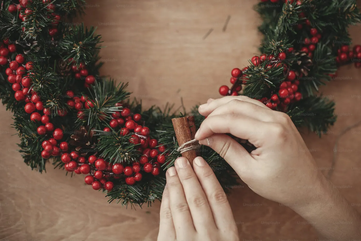 Festive wreath with cinnamon stick - Photo on Unsplash+