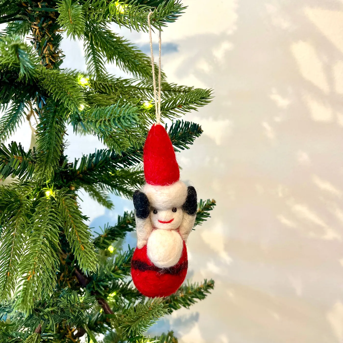 handcrafted felt santa ornament