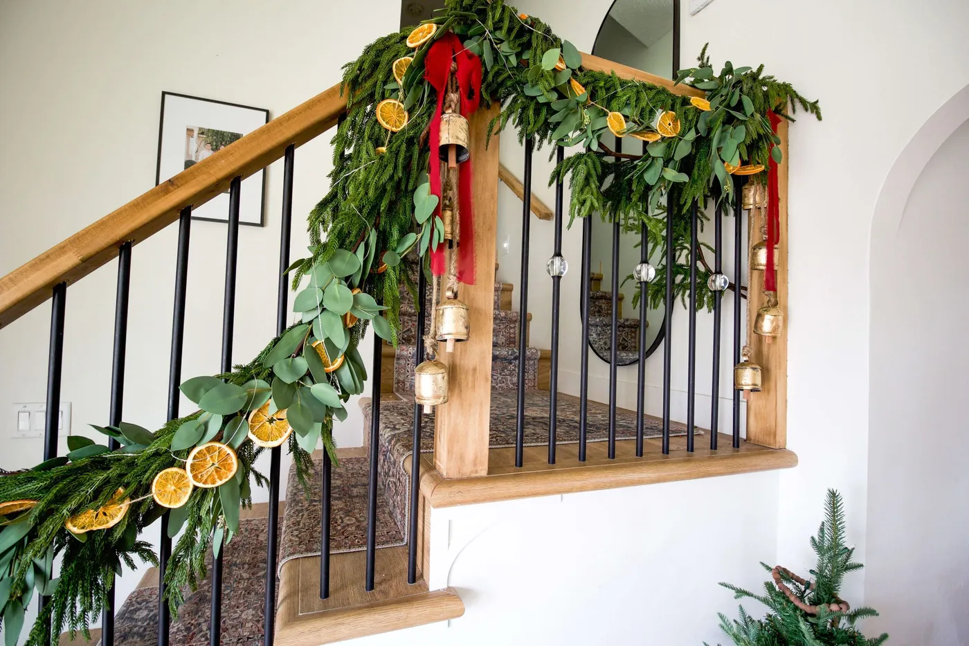 How to Decorate With Christmas Garland on a Staircase | Crystel Montenegro Home