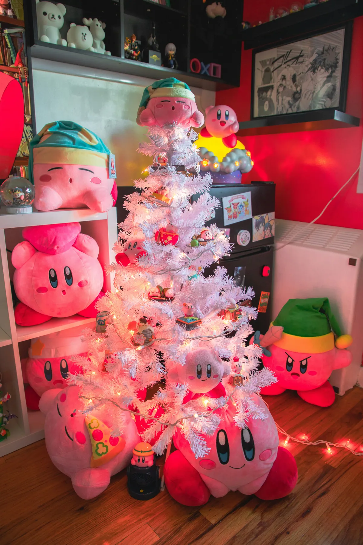 Kirby plush toys decorate a white christmas tree