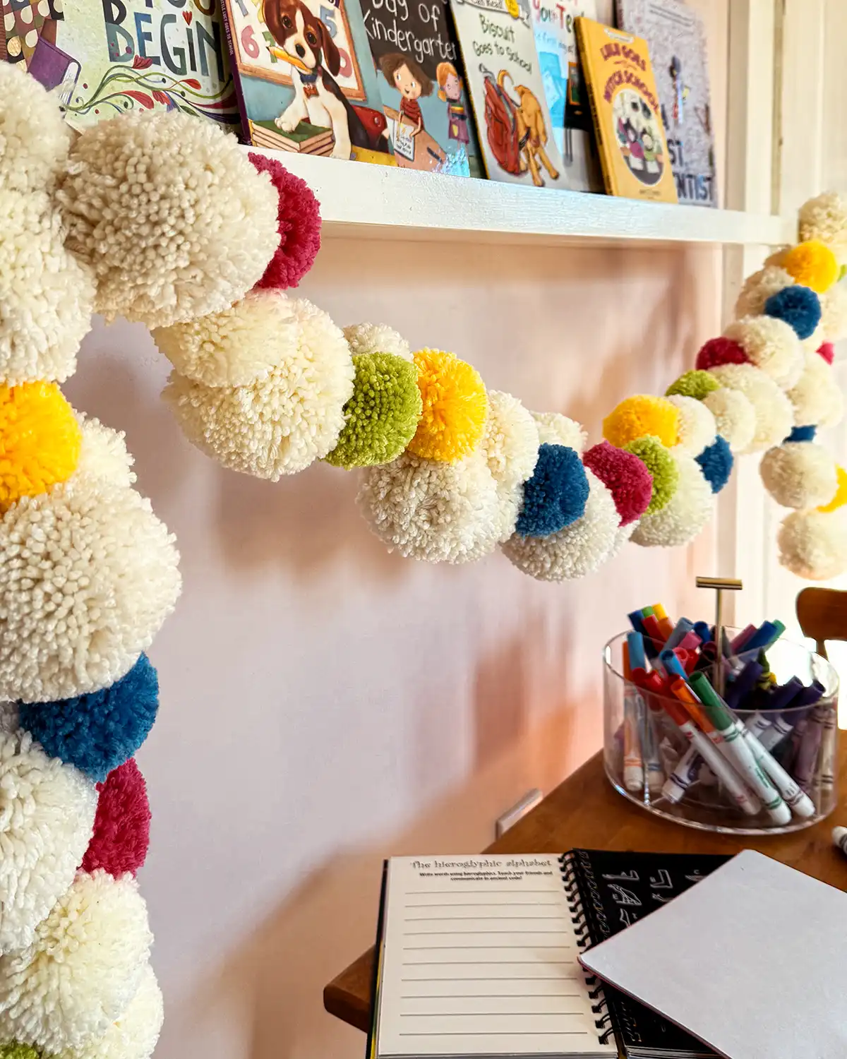 Make The Fluffiest DIY Pom Pom Garland From Yarn