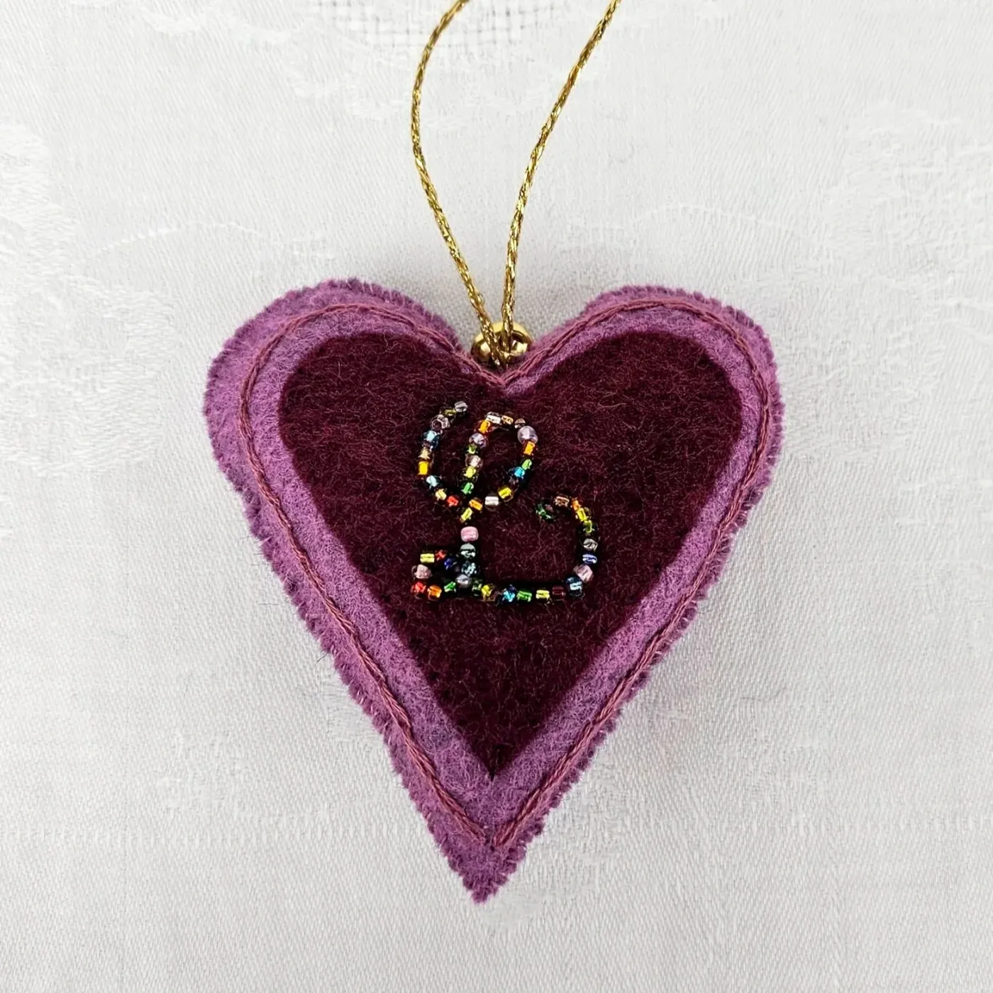 Pōhutukawa heart three flowers - sample — Sara Meade Design - Felt | Colour  | Beads | Thread