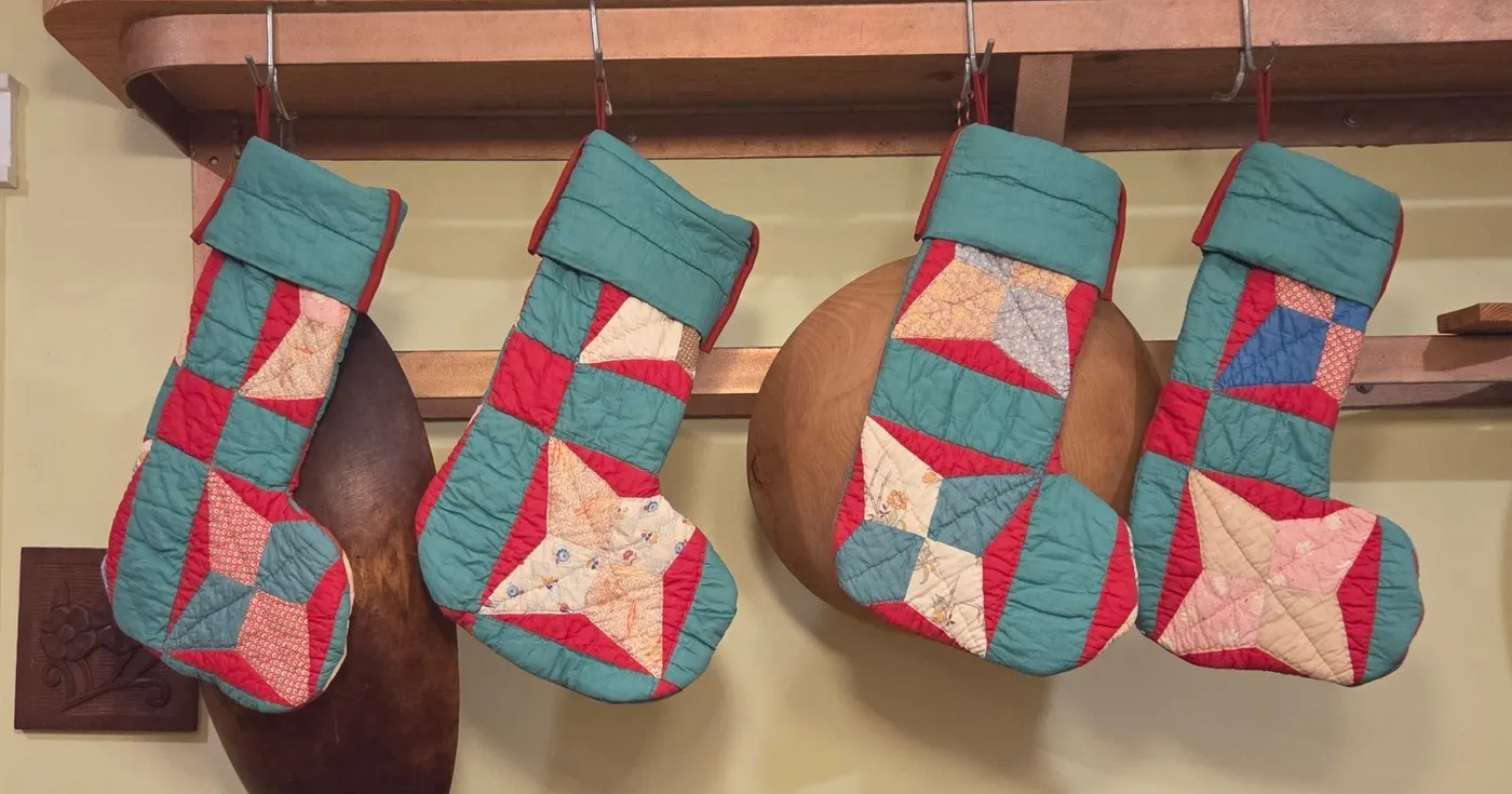 Set of 4 handmade Christmas stockings made of Vintage Quilt