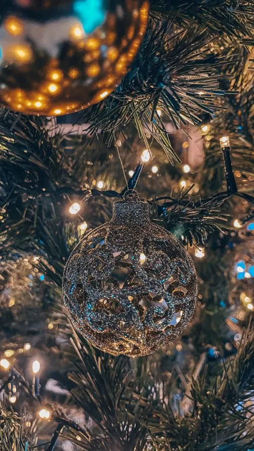 Sparkling Green Ornament on Christmas Tree · Free Stock Photo