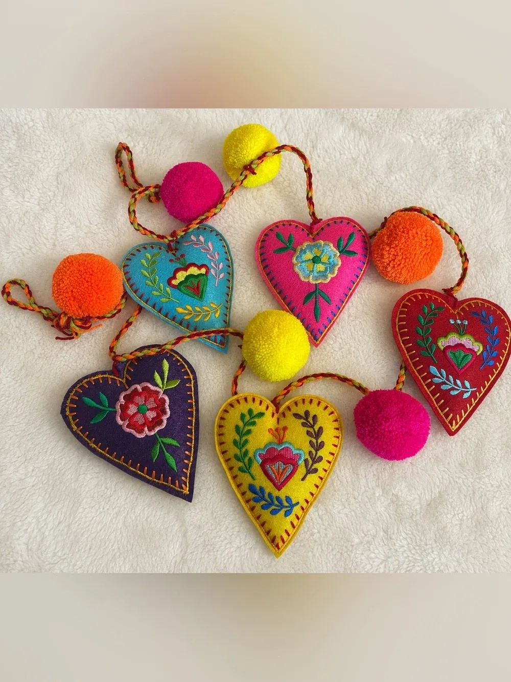 World Market Multicolor Embroidered Heart Pom Pom Garland ptaufiqphotography.com